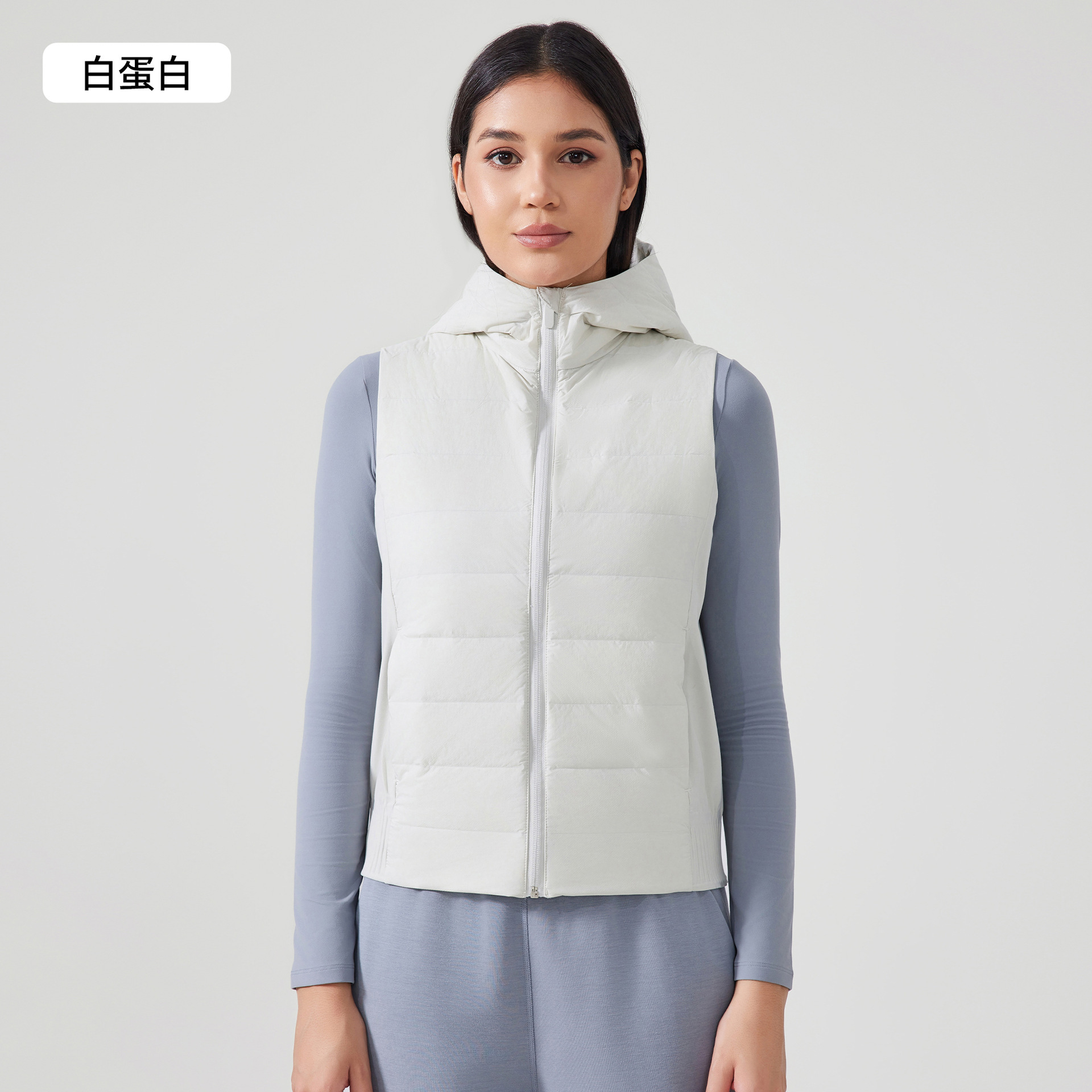 Exportación de comercio exterior Europa y América chaleco de pluma con capuchón caliente ligero de moda universal hombro deportivo de bicicleta chaqueta de fitness