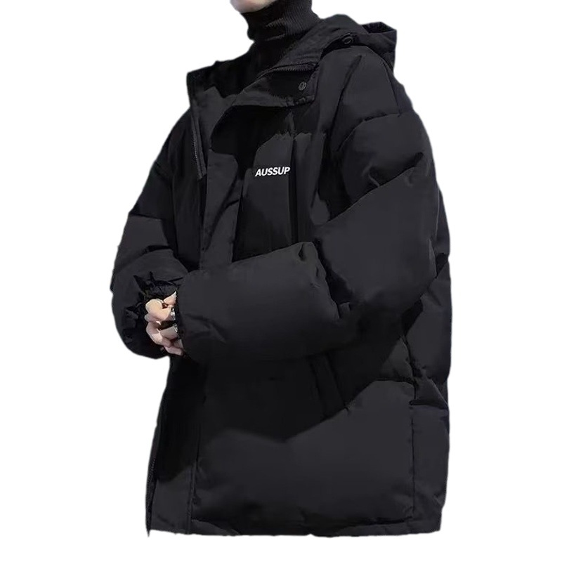 Abrigo de algodón acolchado con capucha de estilo de Hong Kong para hombres 2023 nuevo invierno engrosado abrigo de pan caliente abrigo negro suelto para hombres