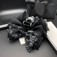 黒の高級感ヘアピン女性気質の花の蝶結びの後頭部のサメは大人の髪のクリップをつかみます。