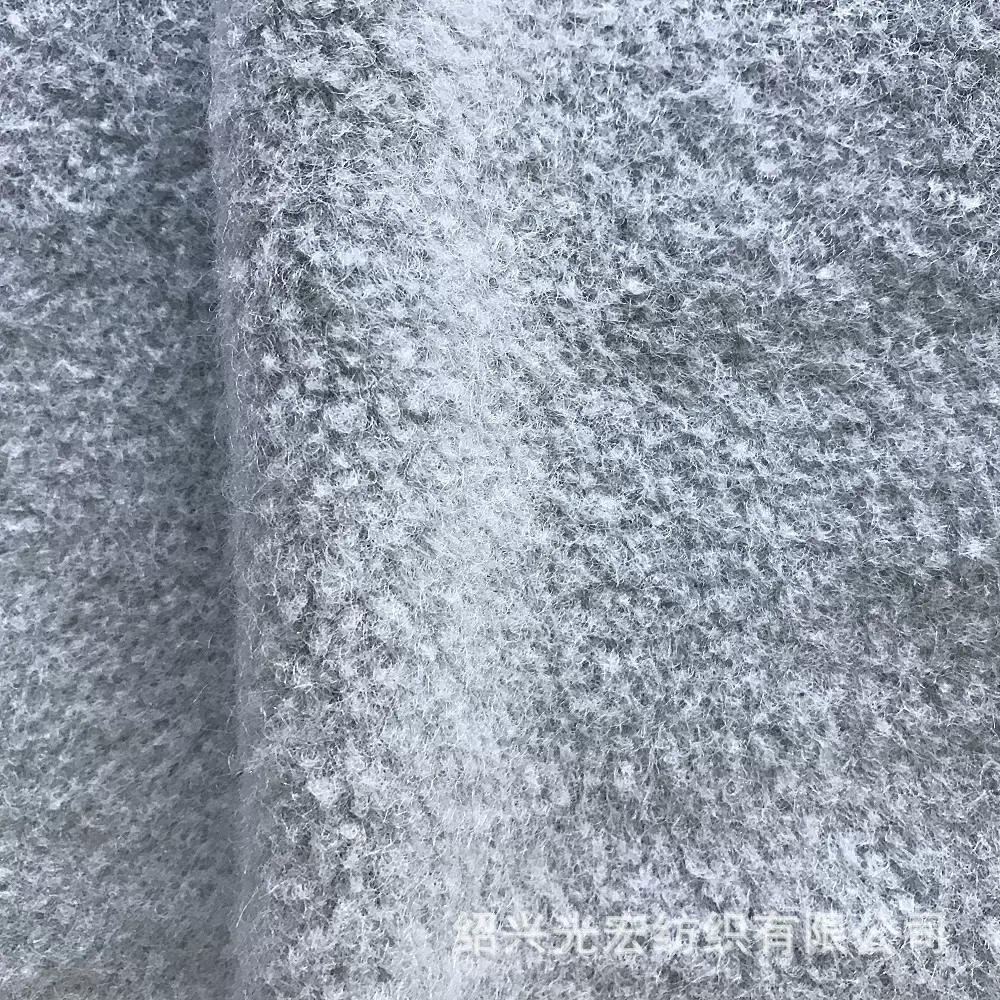 厂家批发欣粒呢三彩呢毛呢面料仿羊绒布料风衣大衣斗篷粗毛呢