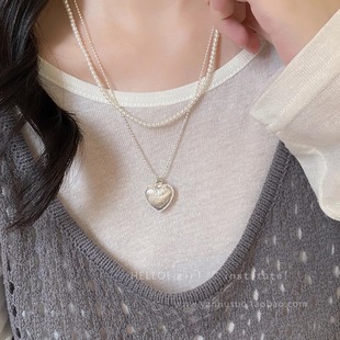 The same style as blogger Korean ins style silver brushed love necklace for women in summer high-end sense stacked sweater chain accessories