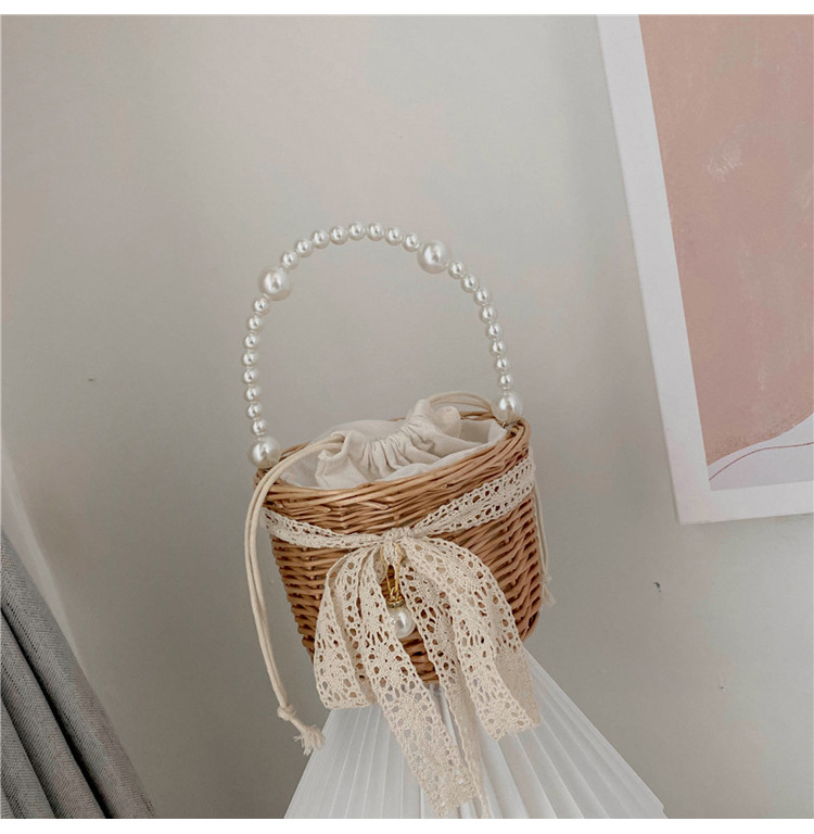 Fashion Round Straw Pearl Portable Bag display picture 9
