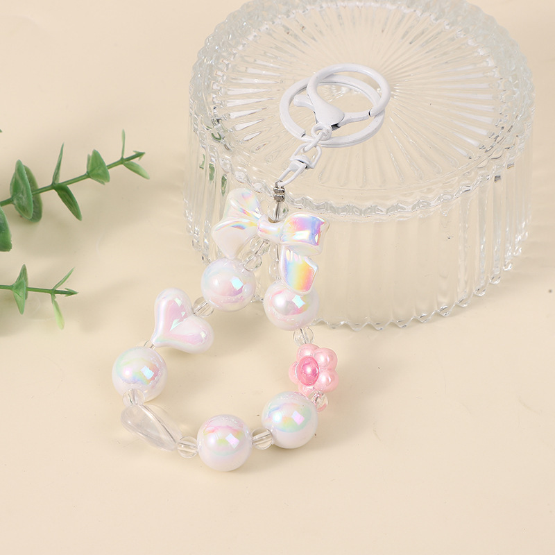 Japón y Corea del Sur color ins hecho a mano con cuentas flor llavero cordón de muñeca macaron color pétalo cordón de teléfono móvil en stock