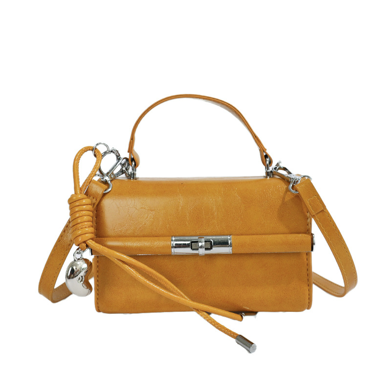 Bolsa de mano transfronteriza para mujeres 2026 nuevo bolso de hombro de verano de alta calidad retro bolso de mano de moda mochila