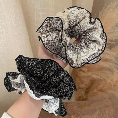 レトロなフレンチレースの小さい花の大腸のシュシュの多層の高級感のスカートの花のつぼみの団子の頭の花の大きいサイズの紐
