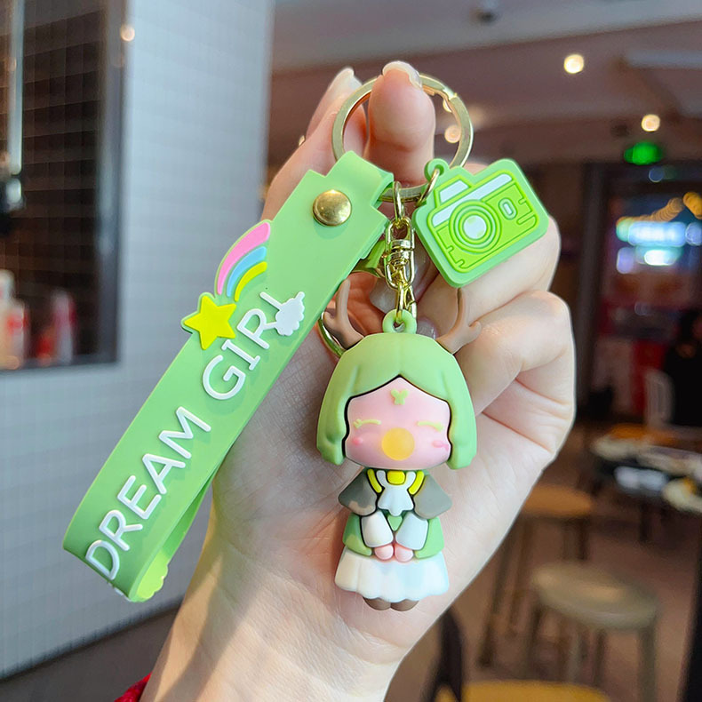 Muñeca de dibujos animados goteo llavero bolsas escolares exquisitas para hombres y mujeres colgantes para agarrar muñecas colgantes para el mercado nocturno regalos al por mayor