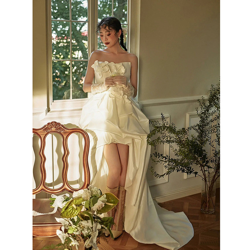 2026 New Style Sexy and Elegant Strapless Bridal Satin Dress with Floral Front, Short in Front and Long in Back, with a Small Train, Fairy-Like for Travel Photography Wedding Dress 2026 New Style Sexy and Elegant Strapless Bridal Satin Dress with Floral Front, Short in Front and Long in Back, with a Small Train, Fairy-Like for Travel Photography Wedding Dress