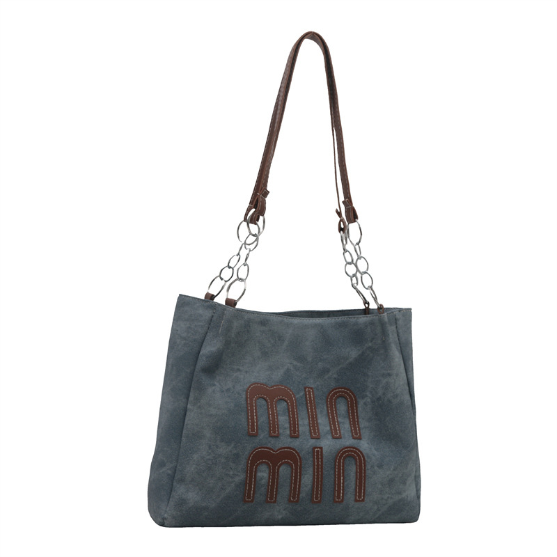 Bolsa de viaje de ocio para mujeres 2024 nueva bolsa de compras de hombro de textura simple de otoño y invierno