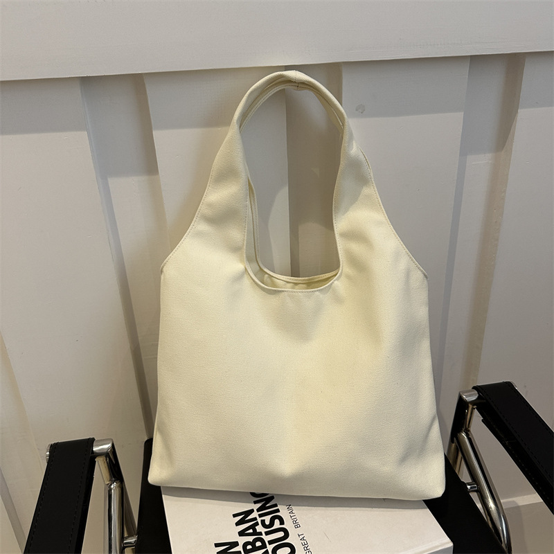 . Moda simple de gran capacidad de verano de color sólido nuevo estilo coreano de moda ocio de viaje bolso de hombro bolso de mujer