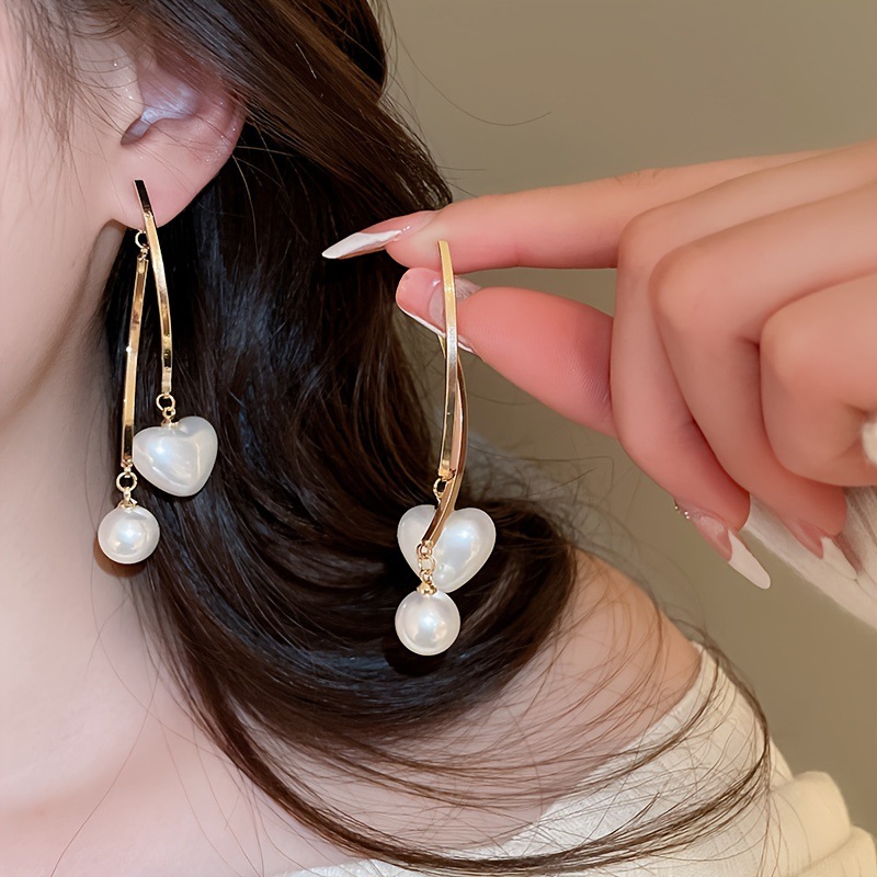 Pendientes de camelia de simulación de aguja de plata Pendientes elegantes retro francés Pendientes de todo fósforo de moda personalizada