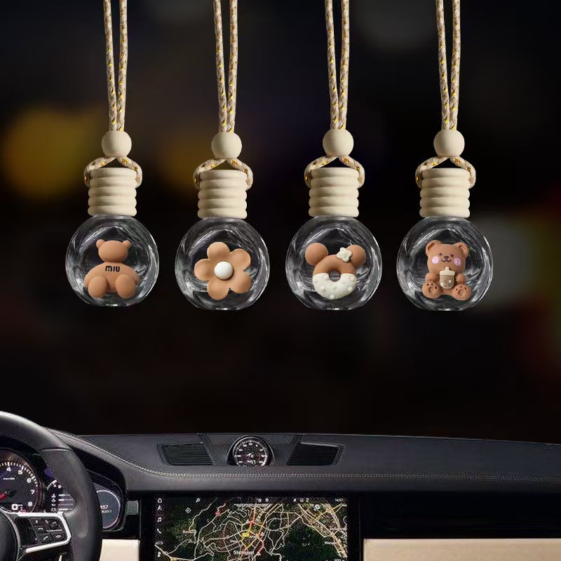 Espejo retrovisor de coche de dibujos animados botella de perfume colgante de coche botella vacía flor creativa botella de aromaterapia de coche aceite esencial decoración de coche