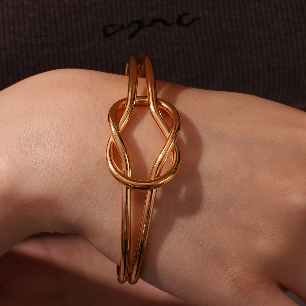 Brazalete de acero inoxidable transfronterizo de 18K personalidad exagerada simple anudado abierto pulsera de acero inoxidable INS todo fósforo venta caliente
