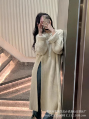 韓国版の怠惰な風のゆったりしたニットのワンピースの女性の秋冬の新型の側はフォークのデザイン感の中の長いタイプのプルオーバーのセーターを開けます。