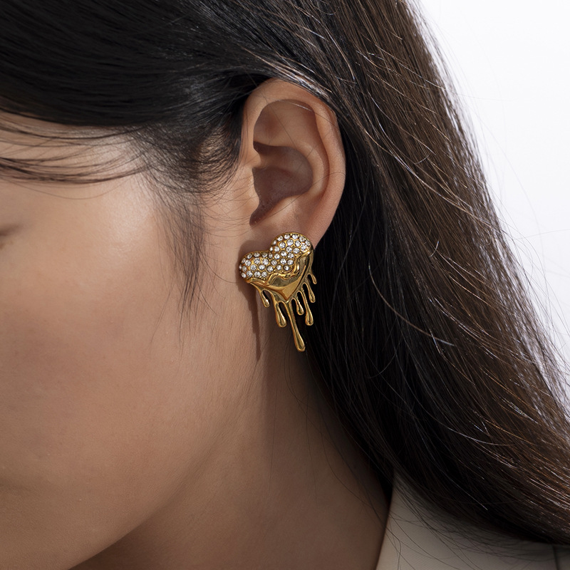 TENA Europa y los Estados Unidos nicho amor ins viento pendientes de acero inoxidable mujeres 18k oro zircón titanio pendientes de acero exagerado sensación de alta calidad