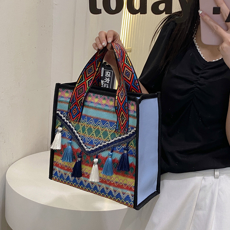 New hand-held fringed shopping bag 2022, fashionable ethnic style, Hong Kong style bucket bag, versatile woven bag for women Specification drawing