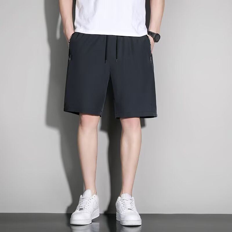 Fábrica de secado rápido pantalones cortos de hombre de verano hielo delgado para usar pantalones sueltos nuevos pantalones deportivos casuales de cinco puntos