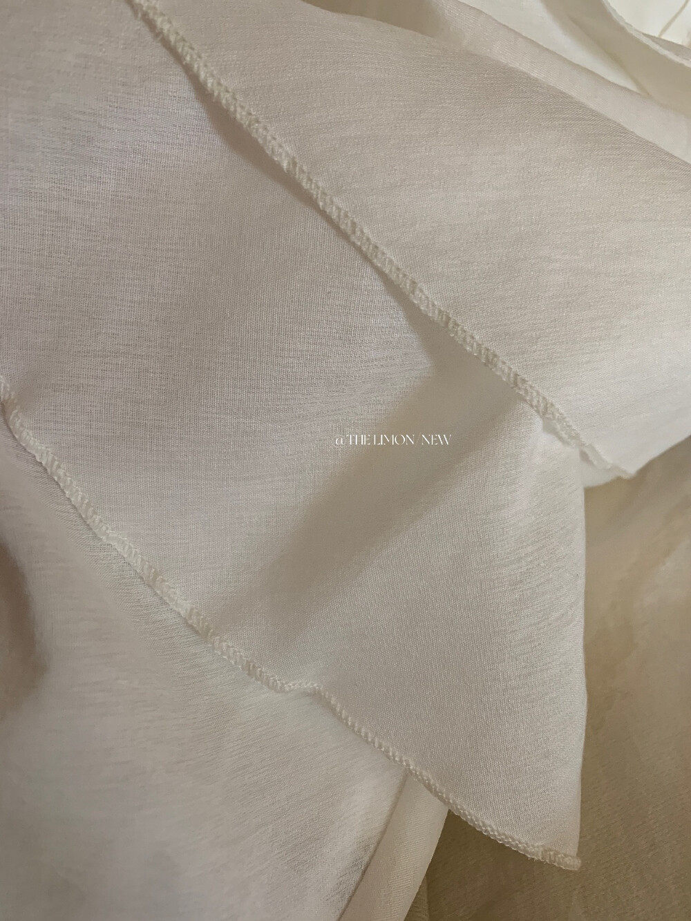 Chân váy midi xếp ly tầng bất đối xứng chất liệu Tencel — màu trắng, Bột cam, màu xám chi tiết 16
