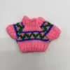 Pink sweater with green waves