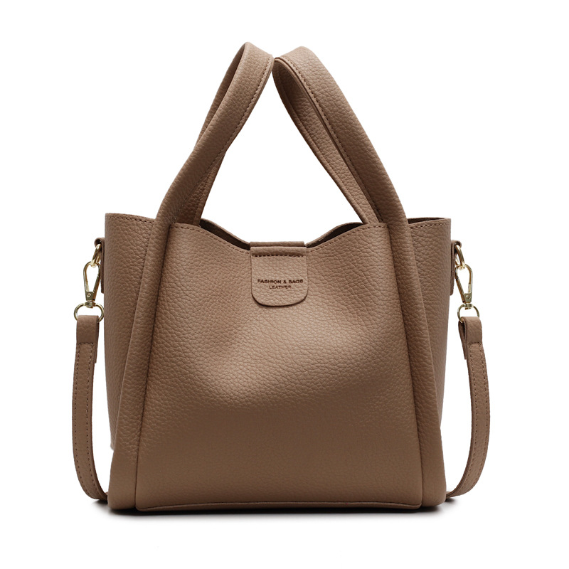 Comercio exterior ocio retro bolso de cubo de mano 2025 nuevo versátil simple bolso de hombro de alta calidad textura mochila