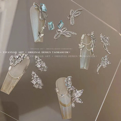 ネイル合金の蝶結びのアクセサリーのネットの赤いタイプの軽い豪華な風はダイヤモンドの超フラッシュのジルコンの水晶の爪をはめ込んで日系を飾ります。