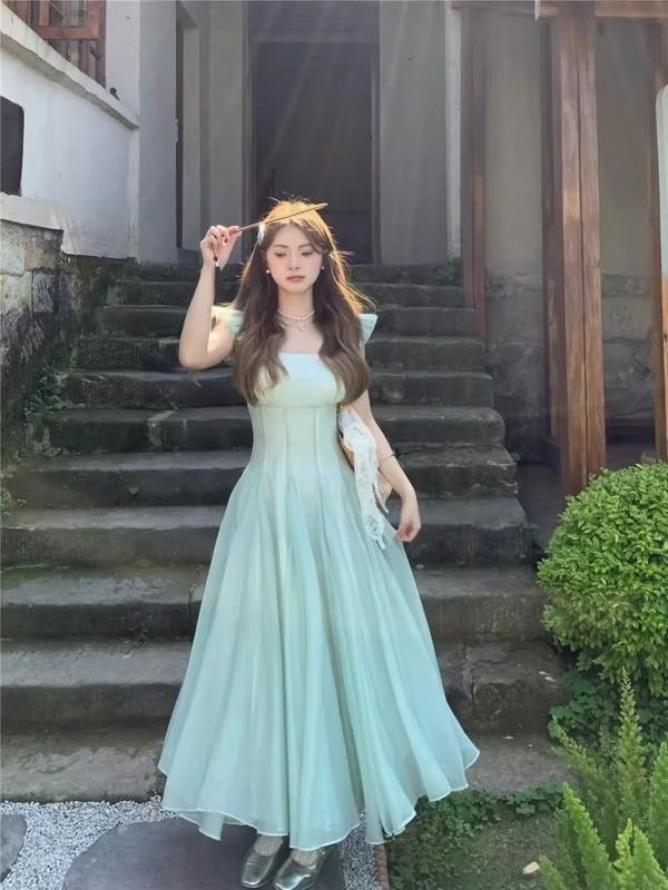 大きいサイズの太ったmmの気質は腰の方襟のワンピースの婦人服の夏の大きいスカートのフランスの気質の飛袖のスカートを収めます。|undefined