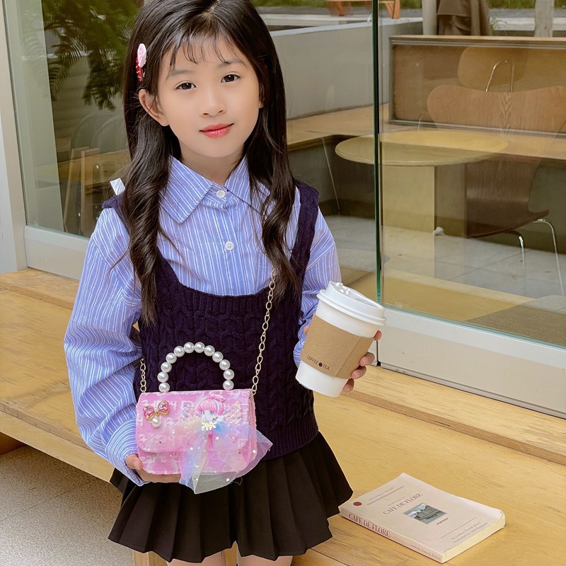 Nuevo bolso para niños niña arco de perla de hombro bolso de mano princesa de estilo extranjero mini bolso de cambio