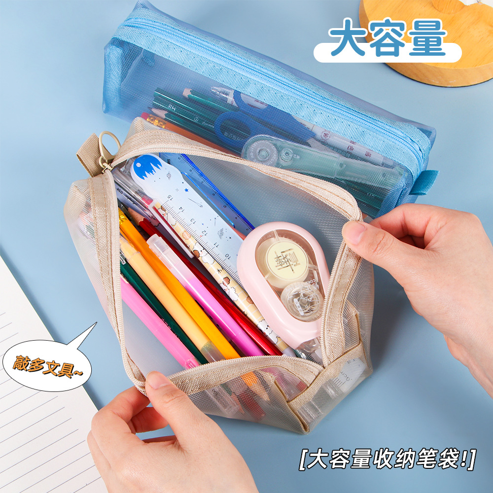 Bolsa de lápiz de malla de nylon transparente creativa ins en la caja de lápiz de papelería de gran capacidad especial para niños y niñas