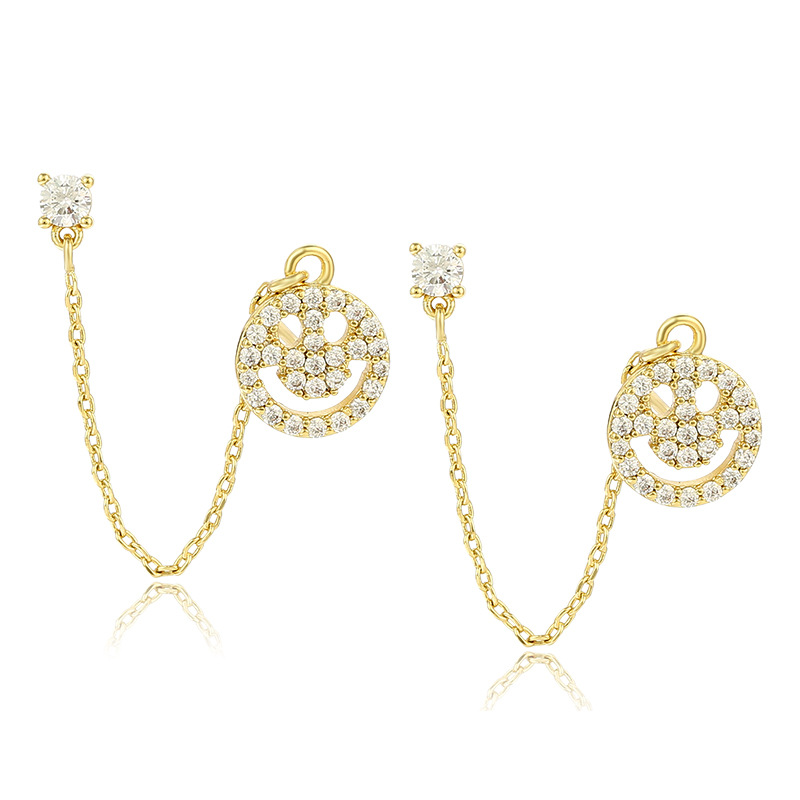 Joyas Xuping personalidad europea y americana sonriente pernos de orejas de aleación nicho ligero lujoso frío orejas de viento para mujeres exquisitas verano