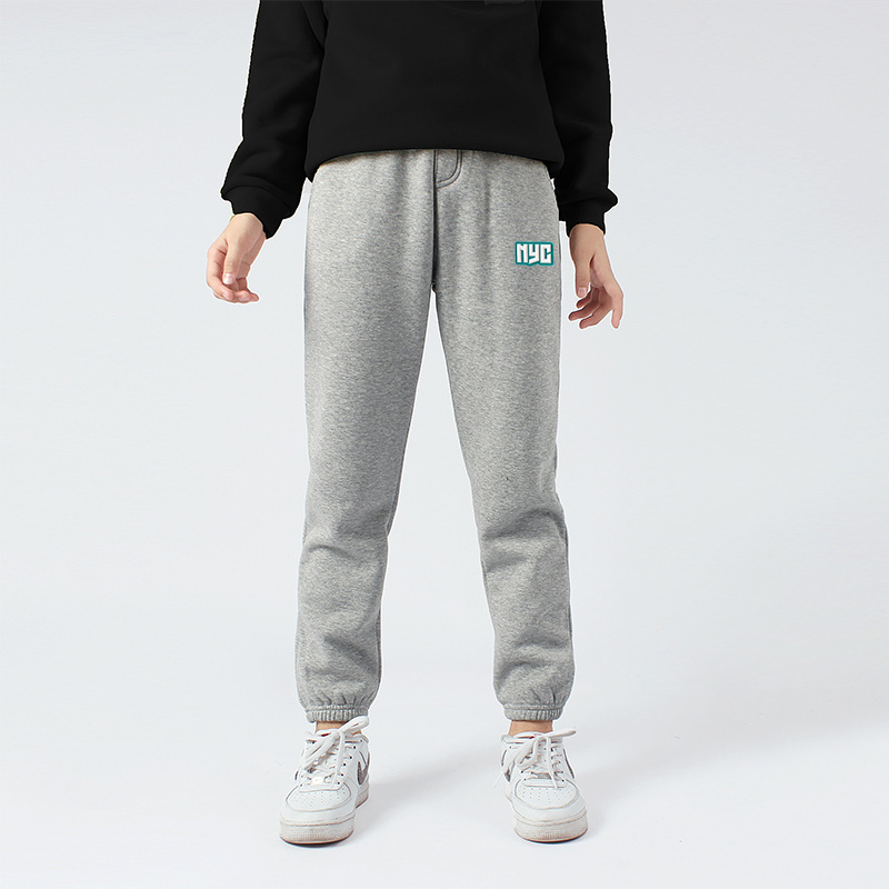 Pantalones de invierno para niños estilo coreano nuevos Pantalones deportivos engrosados para niños medianos y grandes pantalones de niñas calientes forrados de lana al por mayor
