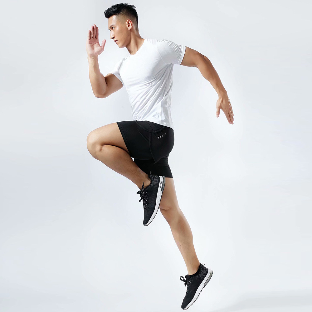 Pantalones cortos deportivos de secado rápido de verano bolsillo trasero de doble capa para hombres pantalones sueltos de talla grande para correr pantalones de entrenamiento de fitness tejidos