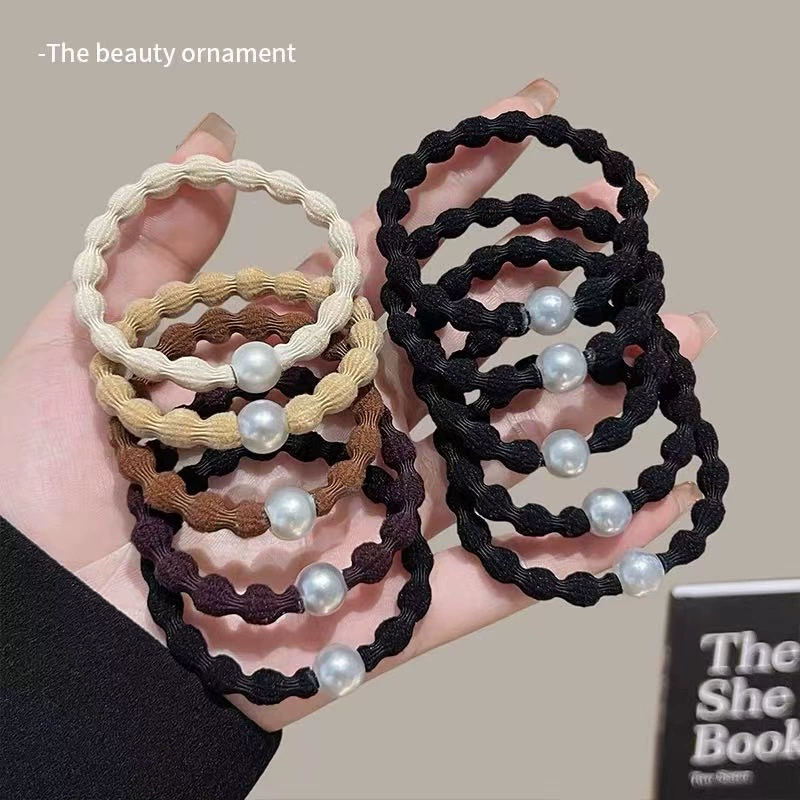 Встряхните кольцо для волос бобов