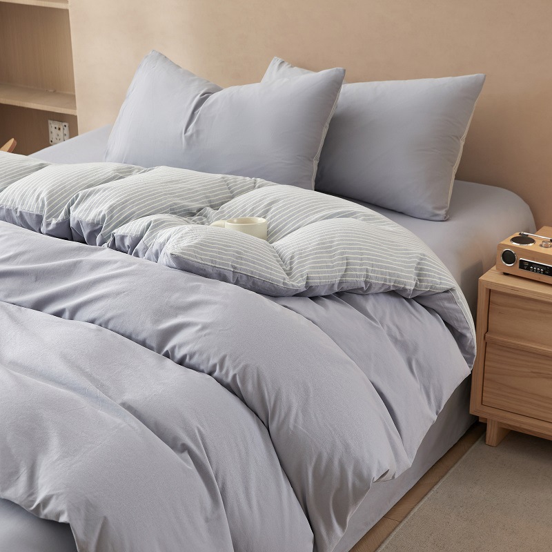 Nuevo traje de cama de algodón lavado de algodón de cuatro piezas de algodón 2025 nuevo traje de dormitorio de funda de edredón de sábana simple de tres piezas