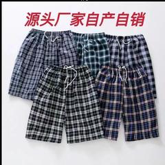 夏の男性の方眼半ズボンの格子の5分の綿は太ってゆったりしています。