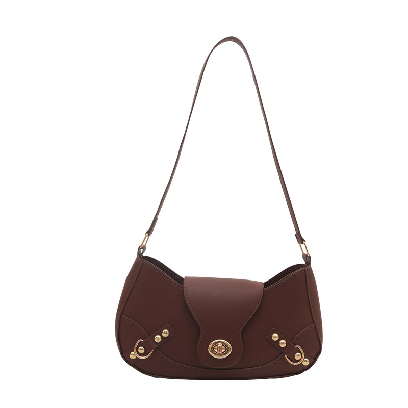 Bolsa de bolinillos retro chica caliente un hombro bolso de mochila para mujeres 2025 nuevo diseño locomotora de cierre de viento bolso de brazo