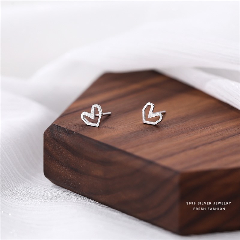 S999 a forma di cuore geometrico cavo per donna, semplice temperamento spazzolato fatto a mano, argento versatile e orecchini_voghion.com