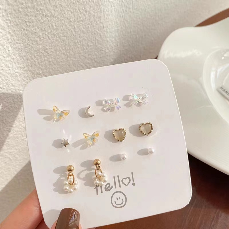Luz de lujo de alto nivel nicho de diseño femenino sensación de aretes de bordilla temperamento perla asimetría joyería perla al por mayor