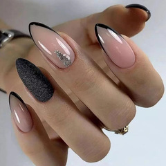 Elegant black French-style sweet-cool glittering almond-shaped nails—inspired "bad girl" look, trendy European and American-style wearable nail tips, available wholesale