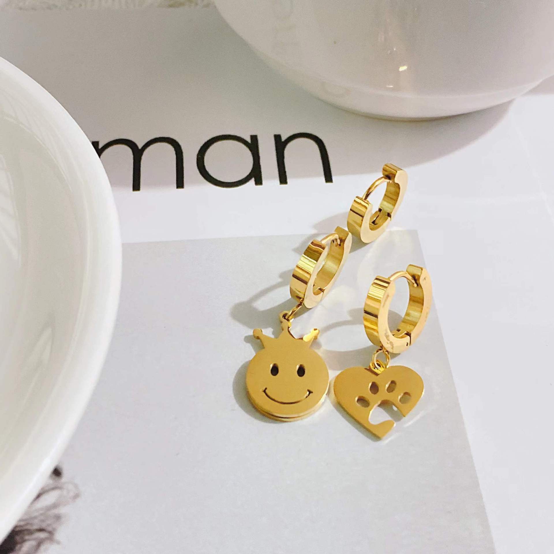 New trendy titanium steel earrings smiley face hollow heartshaped earringspicture1