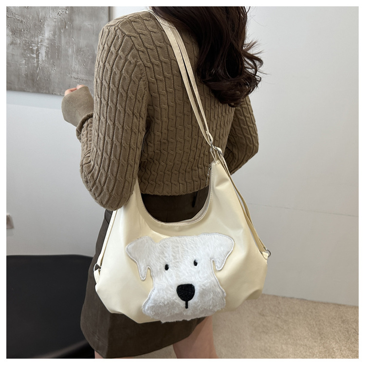 The new autumn and winter 2024 fashion cartoon backpack with simple, individual and niche design, single-shoulder bag and commuter tote bag undefined