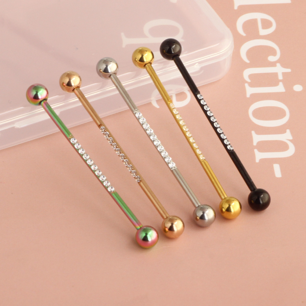 Silver pointed spike labret stud material detail