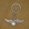 Harry movie Golden Flying Thieves Ball Ball Wing Key Ring Ring Key Ring Gift Buckle Chain