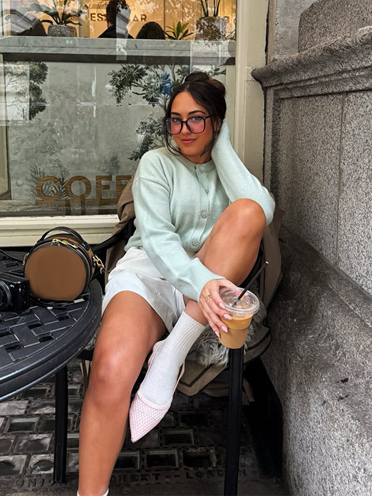 Pequeña moda fresca por favor temperamento color sólido mono hebilla jersey de punto suéter 2025 transfronterizo estilo europeo y americano nuevo otoño y invierno