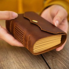 レトロな頭層牛革手帳ポケットミニノートプレゼント落書き本シンプル表記日記帳