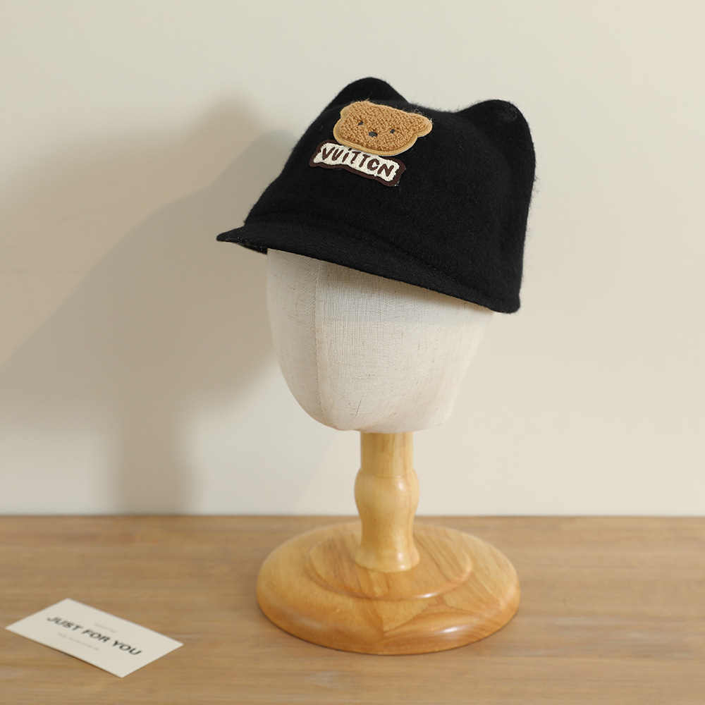 La nueva gorra de orejas de oso lindo y súper lindo niño coreano bebé masculino y femenino otoño e invierno cálido sombrero de copa de lana