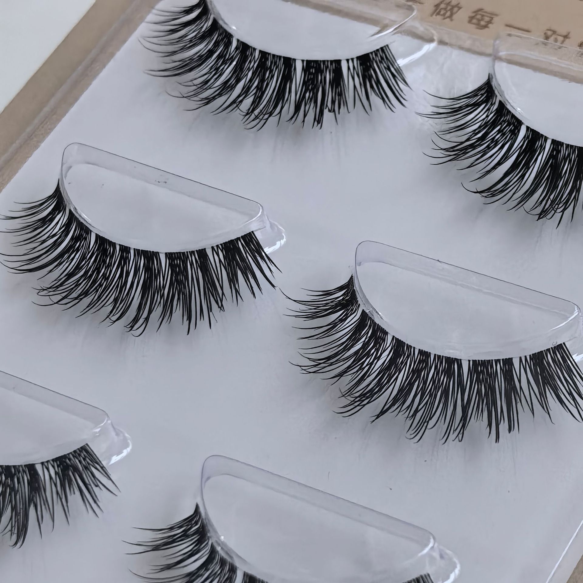 Ai Mo Pestañas postizas nuevas europeas y americanas, simulación gruesa, rizada, pelaje de varios niveles, tallo 3d esponjoso, hilo de seda fino, tallo transparente