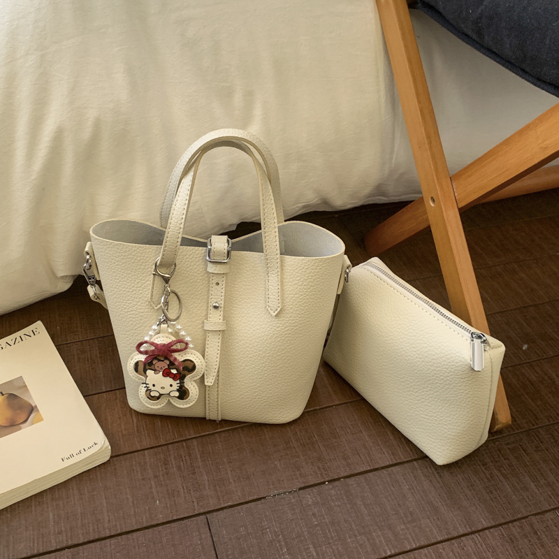 Nicho coreano canasta de platos portátiles bolsos de cubo para mujeres 2026 ventas calientes nuevas bolsas de hombro casuales de gran capacidad