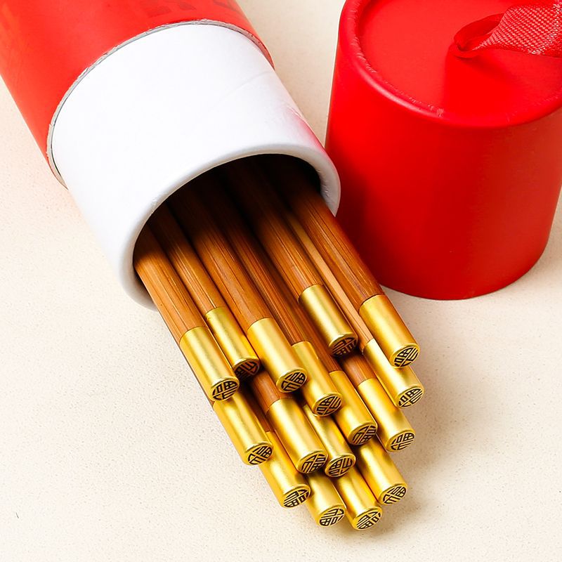 Palillos de regalo de año nuevo Palillos de madera de ala de pollo, caja de regalo, palillos festivos de madera maciza, sin pintura, sin cera, impresión antideslizante LOGO al por mayor