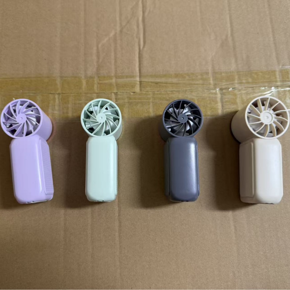 X688 pequeño ventilador transfronterizo de alta velocidad mini ventilador portátil al aire libre USB de carga 100 velocidades de alta velocidad