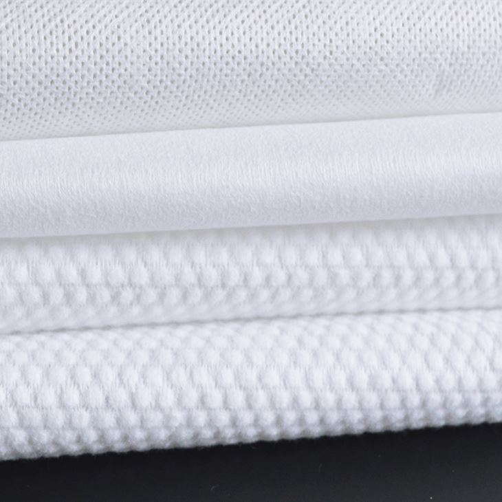 厂家直销45克-100克PP木浆涤纶黏胶防尘纸水刺无纺布珍珠纹