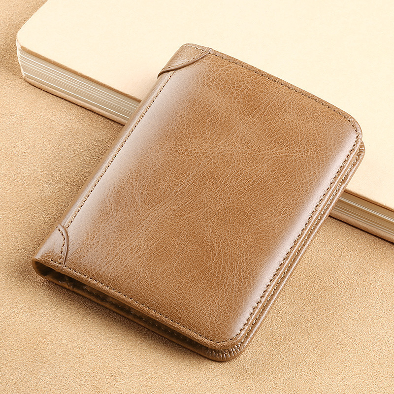 Guangzhou fábrica de cuero billetera de cuero de vaca de hombre, cartera de cuero de vaca de primera capa, cartera de cuero ultrafina de hombre corta, explosión de comercio exterior